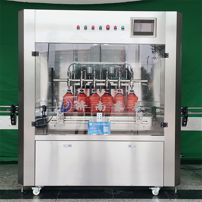 全自動(dòng)油類灌裝機(jī).jpg 全自動(dòng)油類灌裝機(jī).jpg