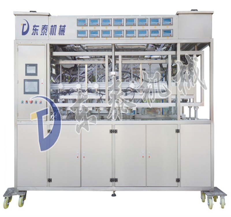 全自動(dòng)稱重式灌裝機(jī).jpg 全自動(dòng)稱重式灌裝機(jī).jpg